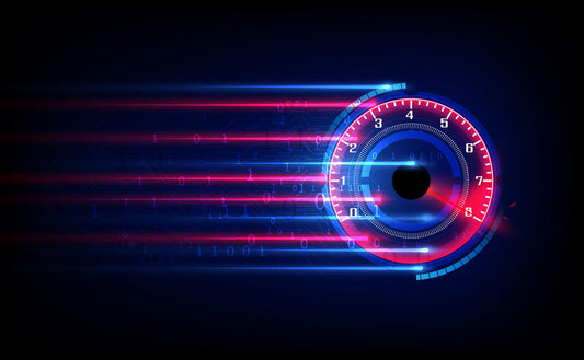 Stop watch with streaking lights on black background