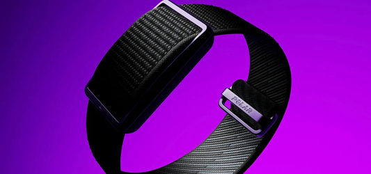 Polar Loop fitness tracker on purple background