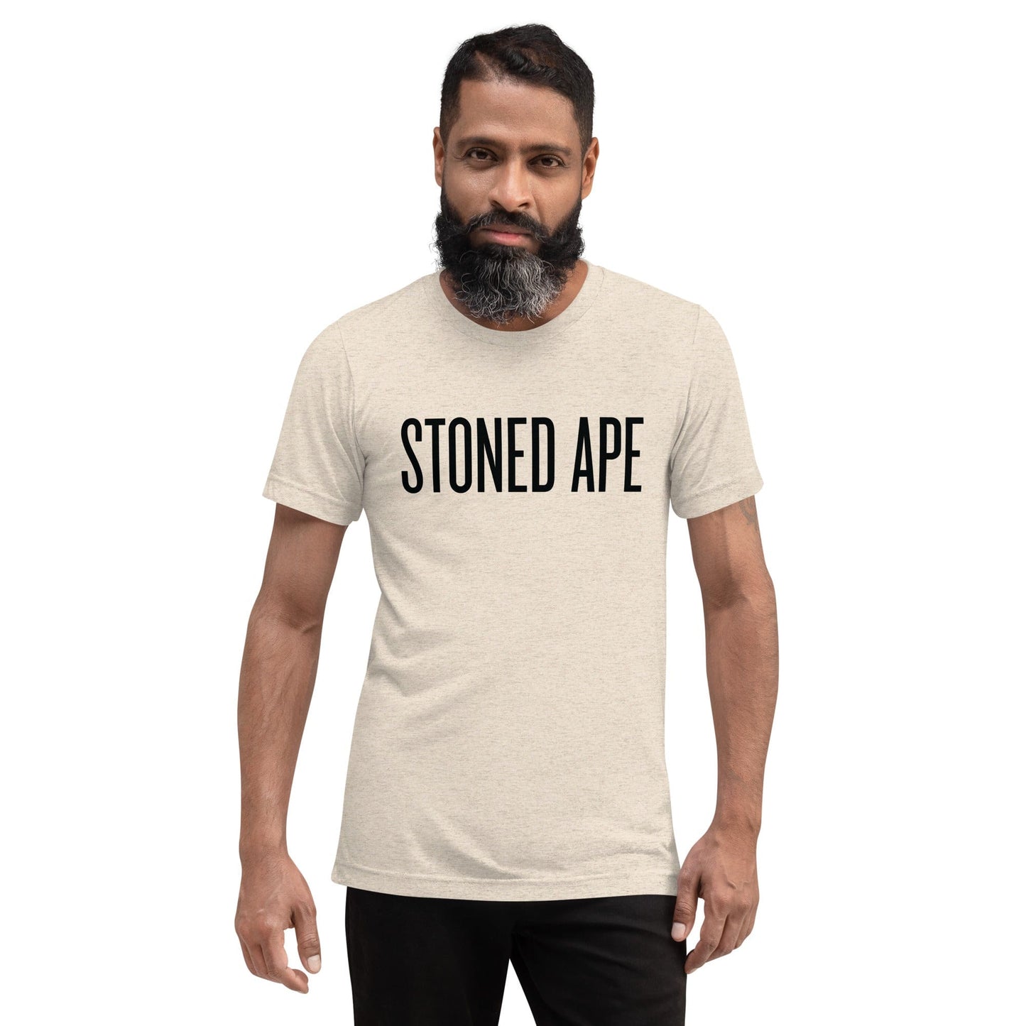 man wearing oatmeal stoned ape t-shirt