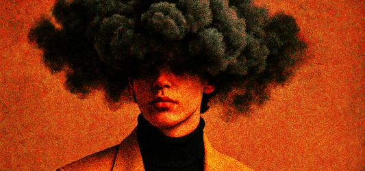 man with head in black storm clouds on orange background