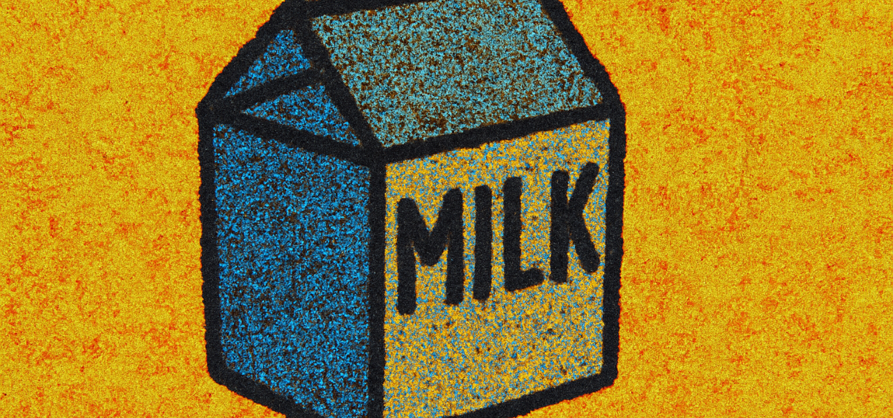 milk carton on yellow background