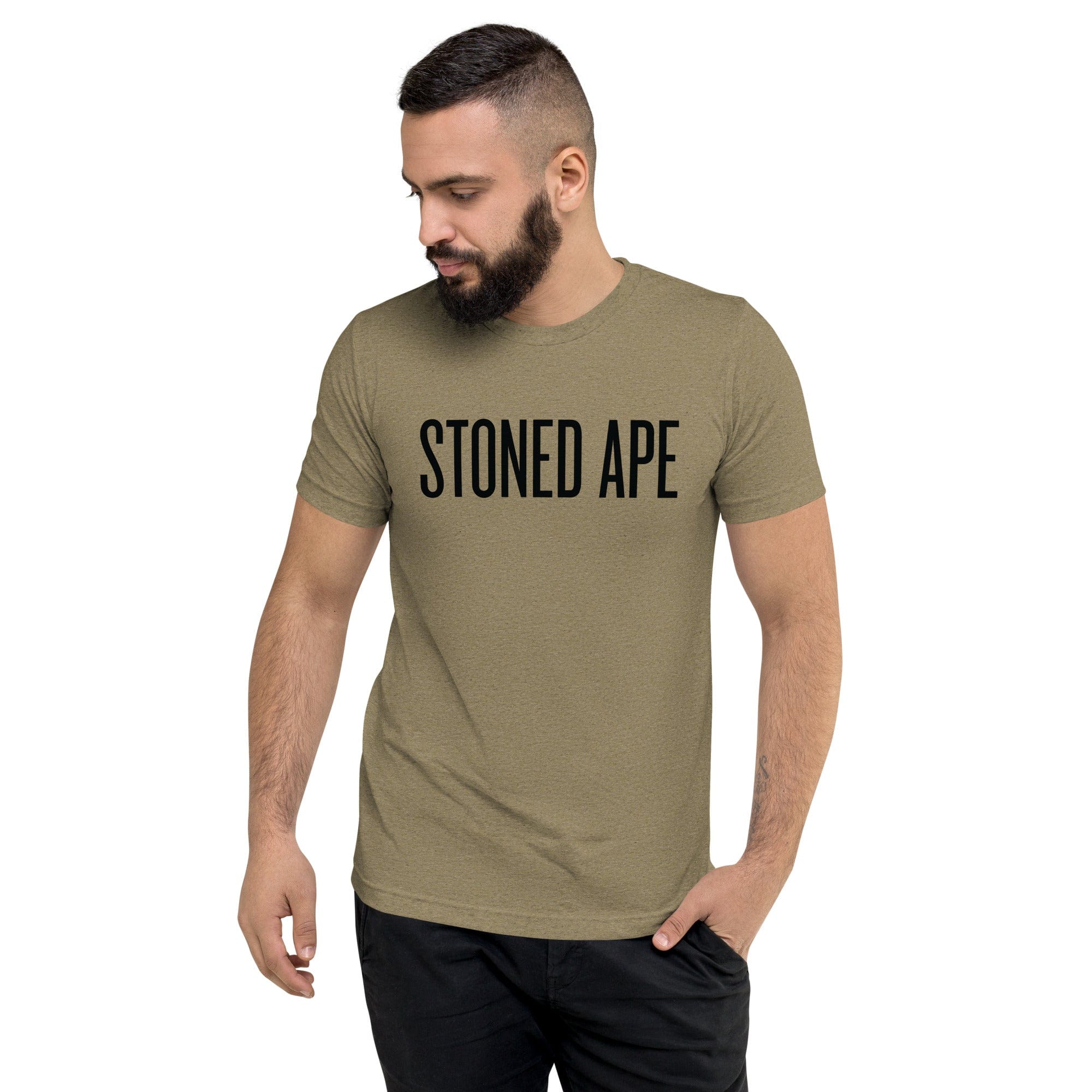 man wearing olive green stoned ape t-shirt