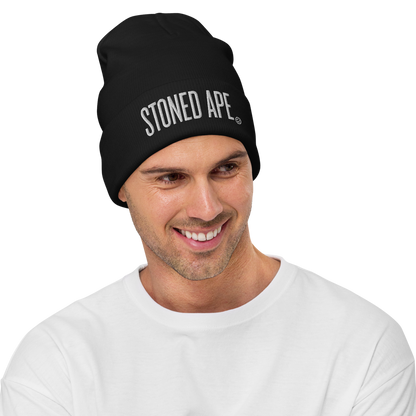 man wearing black stoned ape beanie